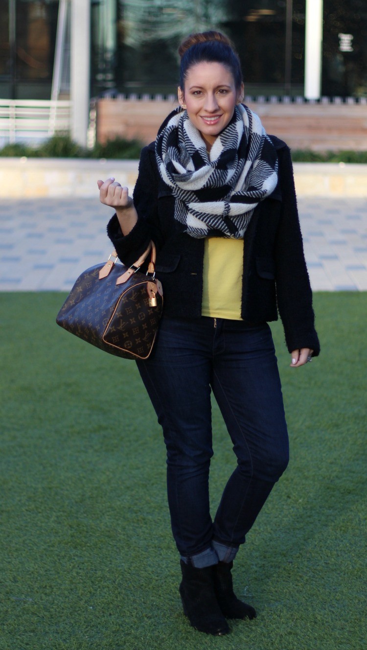 Infinity scarfs, black coat, yellow polo, skinnies, and booties