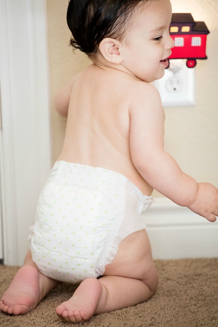 My Baby Boy in Everyday Happy diapers and his choo choo night light