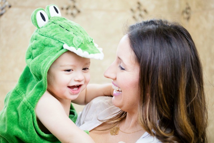 Bath time snuggles in baby Manny's Pottery Barn Alligator towel