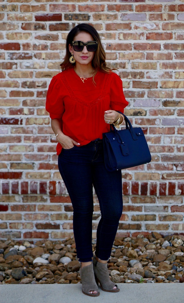 Red lace trim top, dark skinny jeans and booties