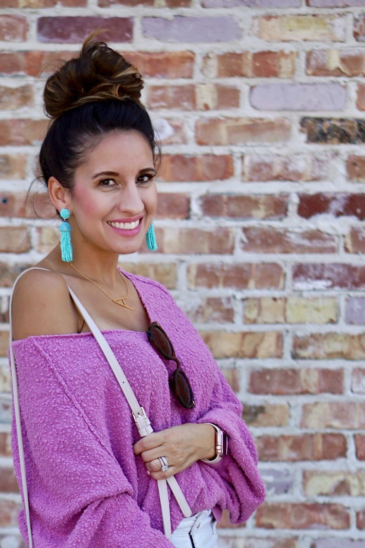 Topknot, slouchy drop shoulder sweater and statement earrings