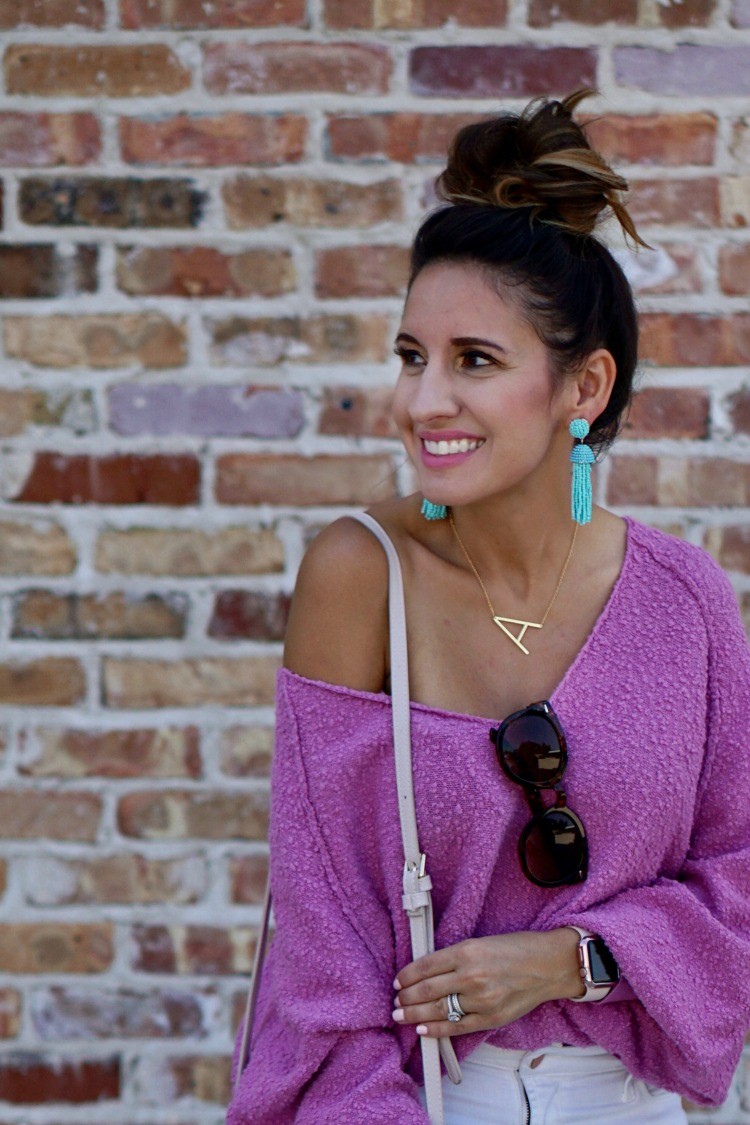 Topknot, turquoise statement earrings, and off the shoulder slouchy sweater