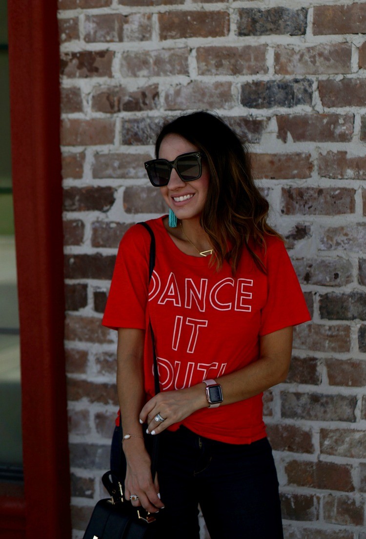Dance it out tee, dark skinnies, and big sunglasses