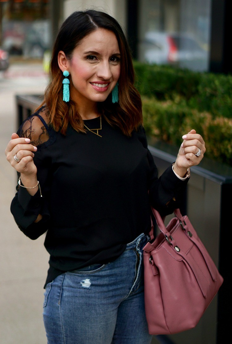 Black lace blouse, skinny jeans, and turquoise earrings
