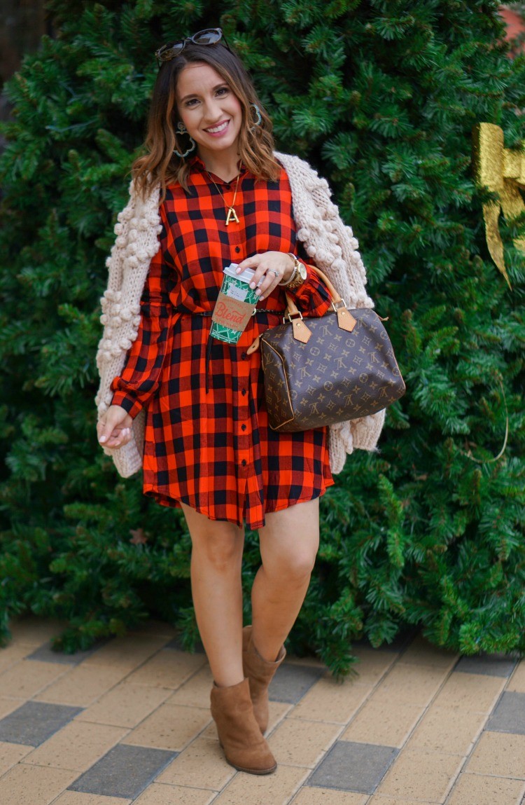 Light pink cardigan, buffalo plaid dress, and nude booties