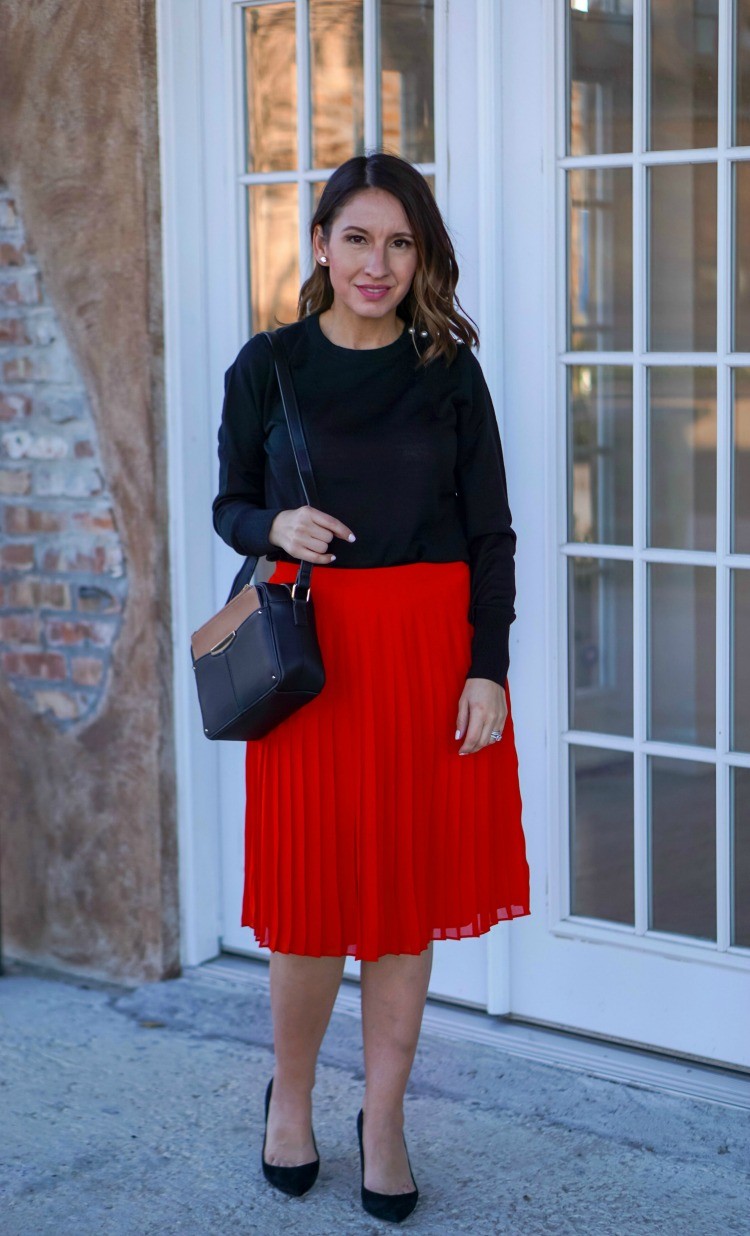 Ann Taylor black sweater, red skirt, and black heels