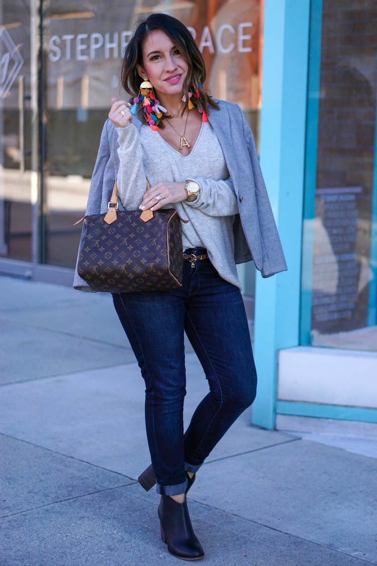 Stella and Ruby Statement earrings, blazer, lightweight sweater, dark skinny jeans, and booties