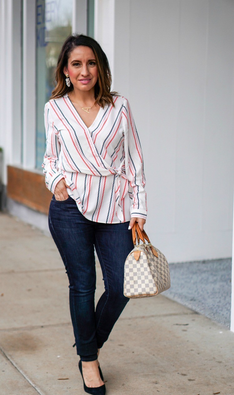 Faux wrap blouse, dark skinny jeans, black heels, and Louis Vuitton Handbag