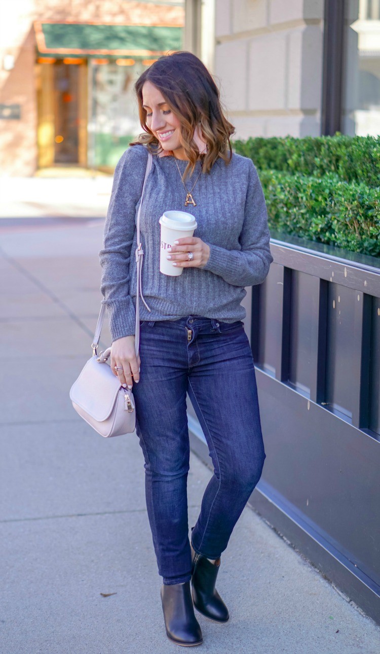 Grey ribbed sweater, skinny jeans, booties, and statement earrings