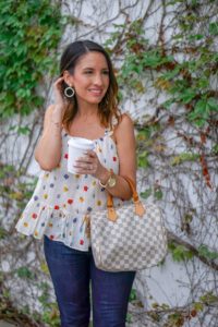 Floral Peplum top, skinny jeans, Louis Vuitton Handbag and pearl hoop earrings