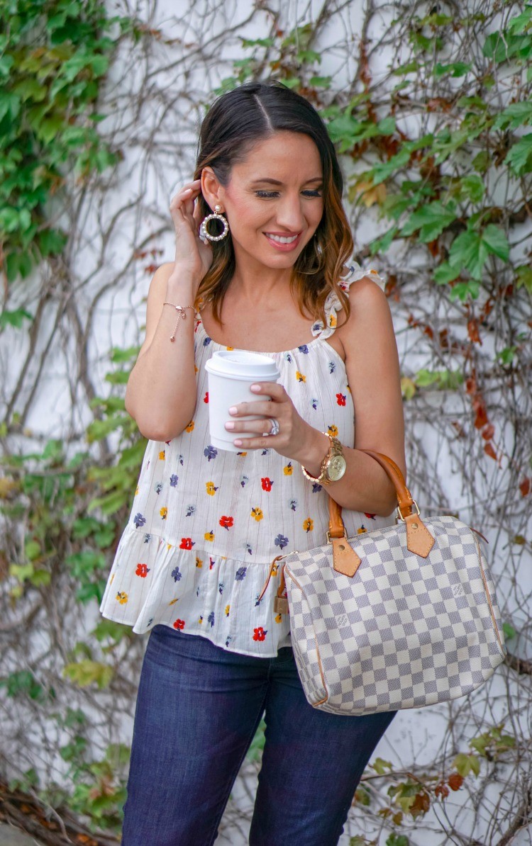 Floral top, skinny jeans, Louis Vuitton Bag, and Pearl Hoops