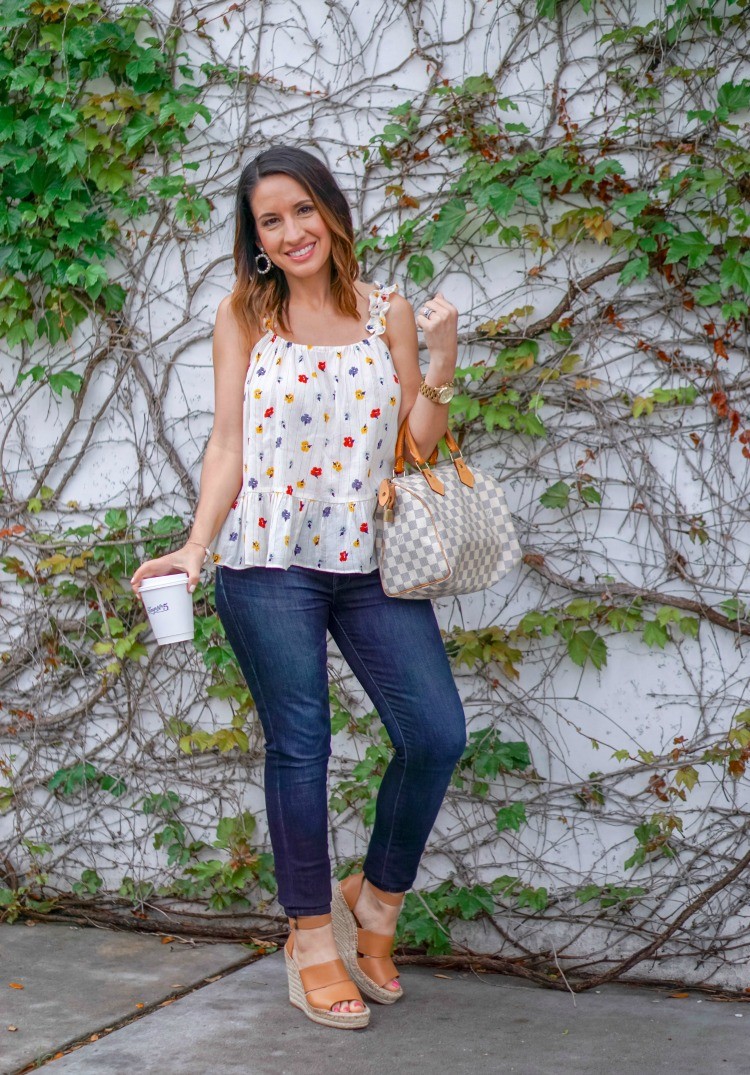 Floral top, skinny jeans, nude wedges, and Louis Vuitton bag