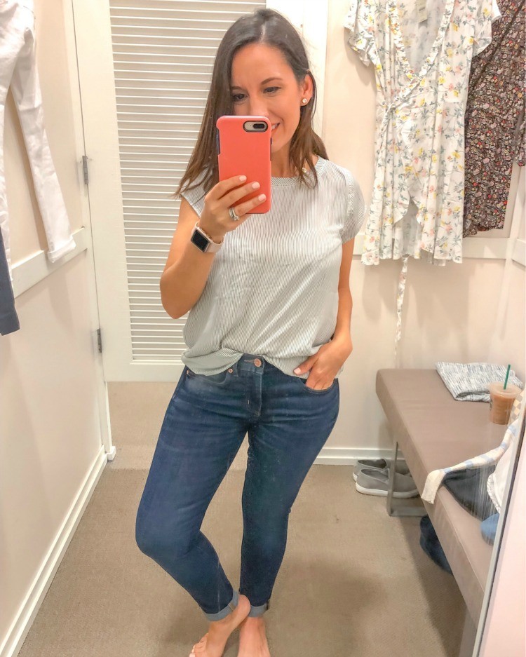 Striped top, and dark blue jeans